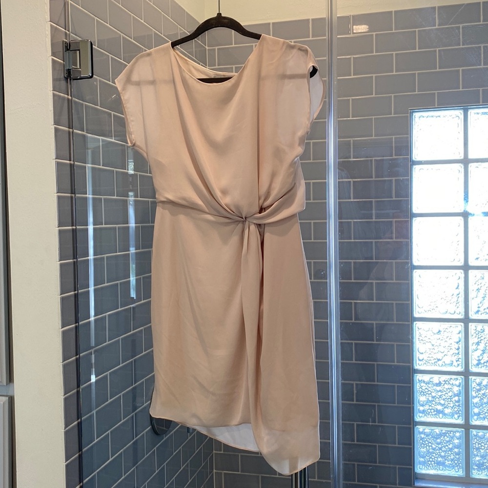 Beautiful mini cream cocktail dress with front twist